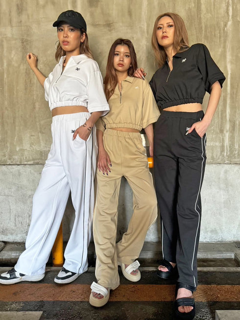 ハーフZIPロゴ刺繍トップス