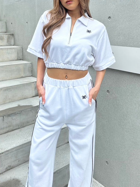 ハーフZIPロゴ刺繍トップス