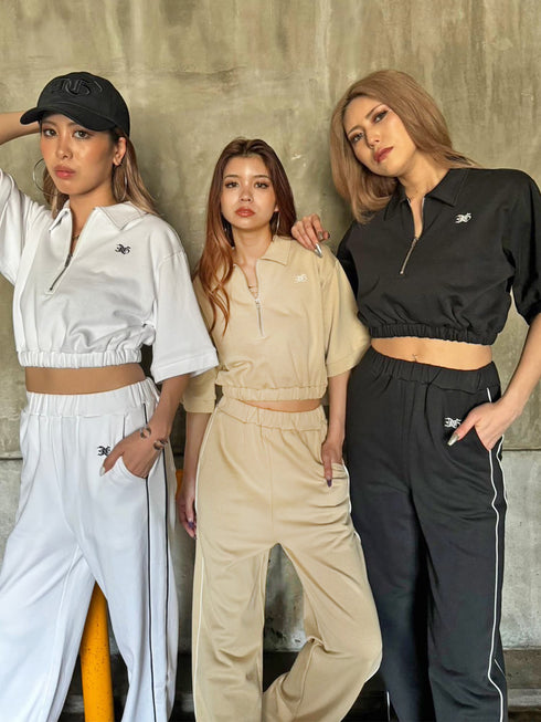 ハーフZIPロゴ刺繍トップス