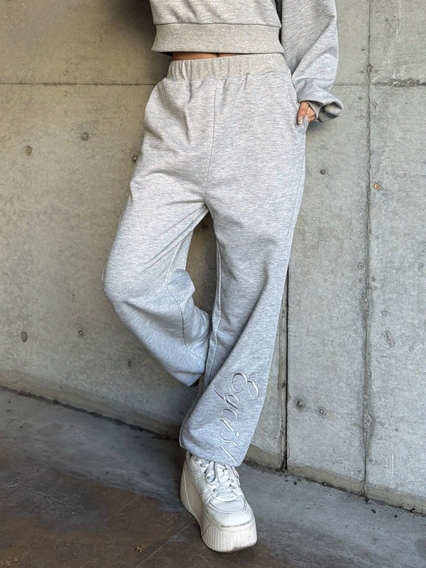 裾ロゴラメ裏毛パンツ