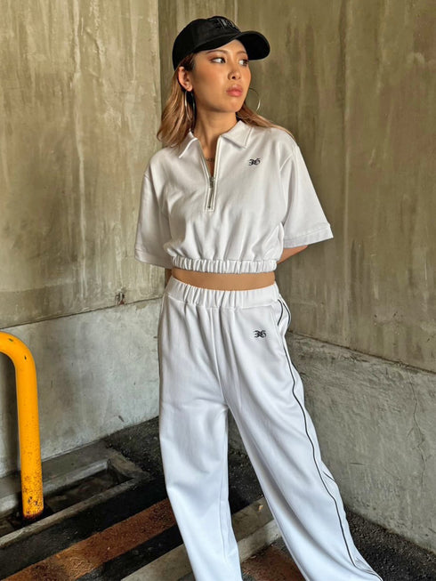 ハーフZIPロゴ刺繍トップス