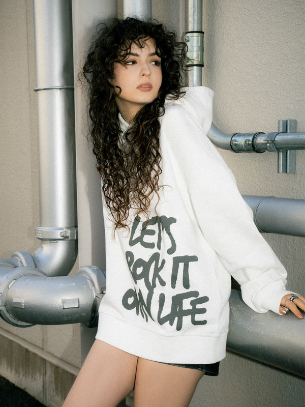 裾ロゴ裏毛トップ