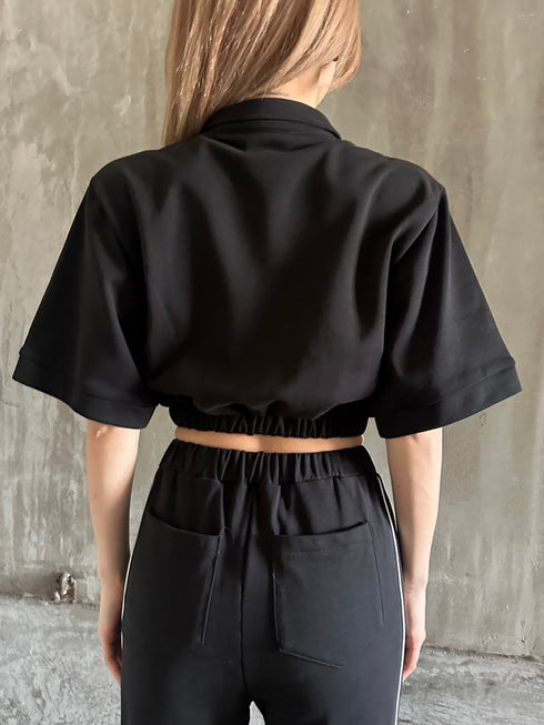 ハーフZIPロゴ刺繍トップス