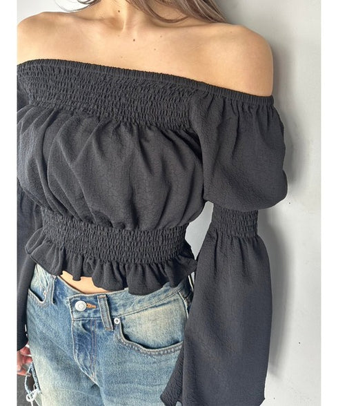 オフショルシャーリングトップス
