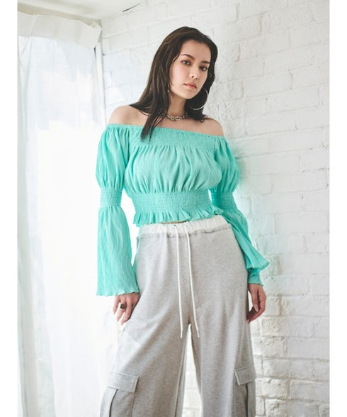 オフショルシャーリングトップス