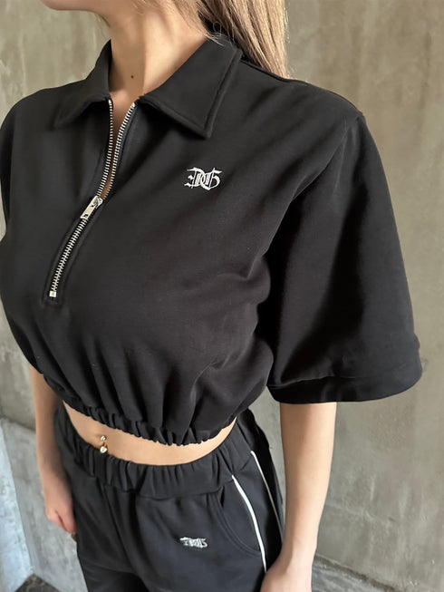 ハーフZIPロゴ刺繍トップス