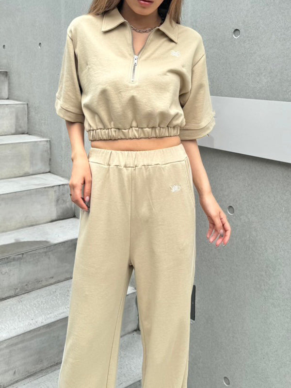 ハーフZIPロゴ刺繍トップス