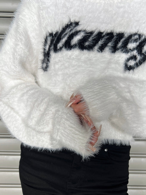 ロゴシャギーニットトップス